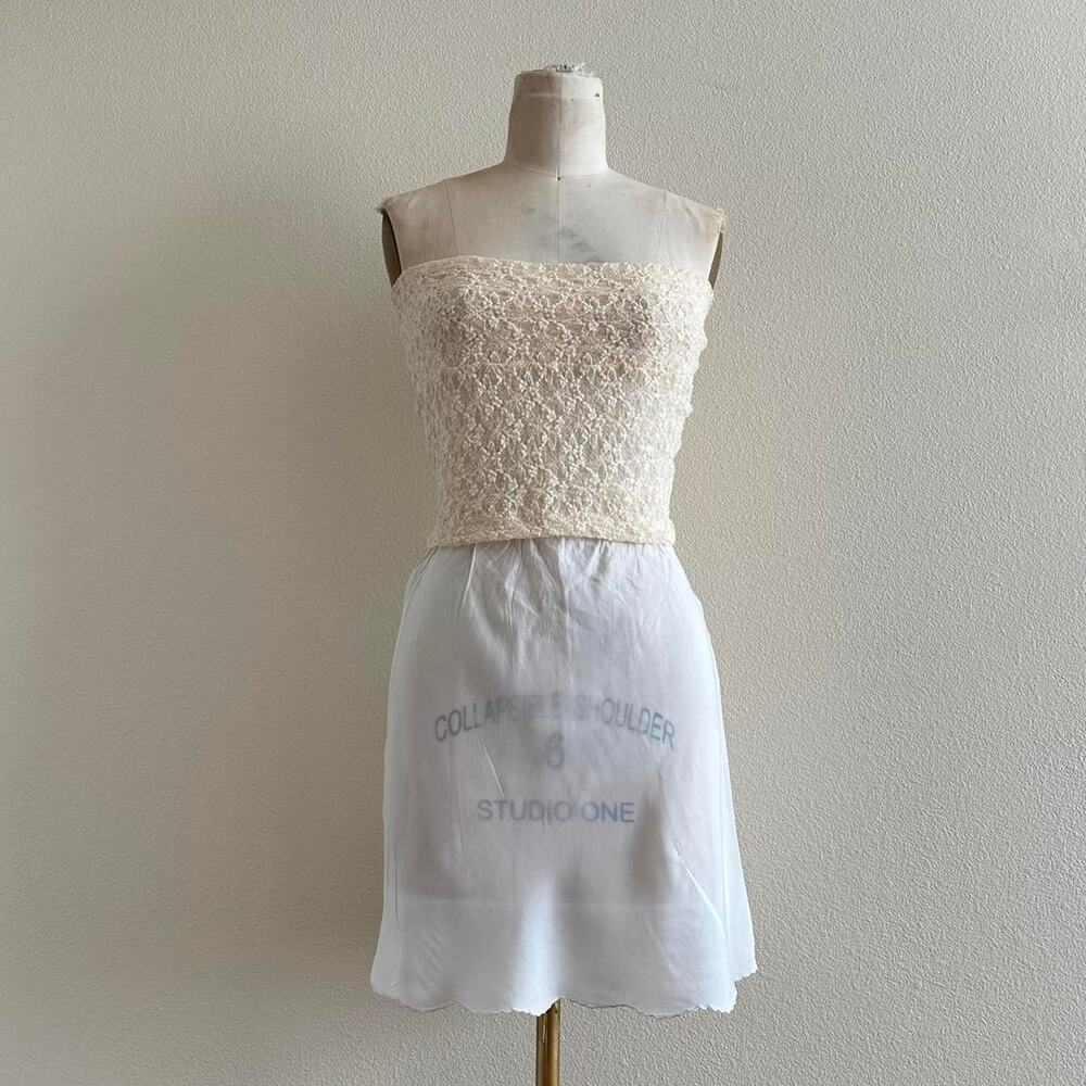 handmade white slip mini skirt with a scallop hem and stretchy waistband